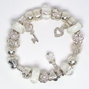 Wedding charm bracelet with white, silver, heart clip, bridal details, Murano glass, faceted glass beads, and European charms on an authentic Pandora bracelet